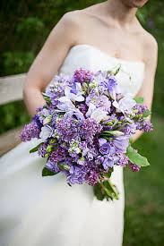 Here, the lillipillian added a purple succulent to an arrangement of dahlias, garden roses, and lavender. Purple Lilac Wedding Bouquets Novocom Top