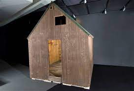 Kaczynski's cabin can be seen near the center of the frame. Unabomber Objects To Newseum Cabin Display
