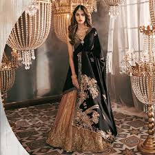 Black And Gold Party Dress Pakistani Sadaf Fawad Khan Studio On Instagram A Bold And Beautiful Combination Of Gold With A Majes In 2020 Pakistani Bridal Dresses Bridal Dress Fashion Velvet Dress Designs