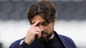 Suits you sir, Team GB water polo captain tries a little piece of Olympic  history for size