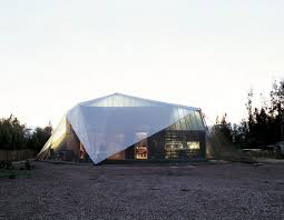 The curving copper roof over a transparent glass structure is what makes this house different from most glass houses. Unique Wall House Design Glass Roof Home Decoration Viahouse Com
