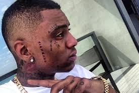 This tattoo symbolizes soulja boy's outlook on life and how he believes he can do anything in this world that is based off of his musicianship and style. Soulja Boy To Sign With Cash Money Gets Rich Gang Face Tattoo