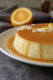 You Don T Have To Be On A Tropical Vacation To Enjoy A Slice Of This Silky Smooth Orange Coconut Flan It S Just As Easy To Coconut Flan Dessert Recipes Flan