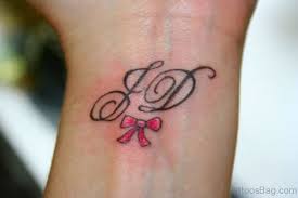 Heart tattoo with sons' initials. 60 Pleasing Initials Tattoos On Wrist