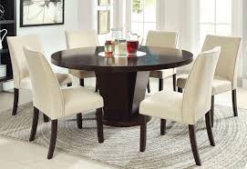 A glass top table that looks extra sleek and shiny thanks to its gold pedestal base. Round Dining Table For 6 You Ll Love In 2021 Visualhunt