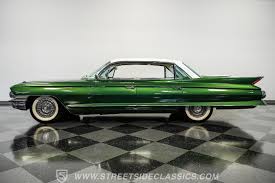 Image result for Granada Green 1961 Cadillac