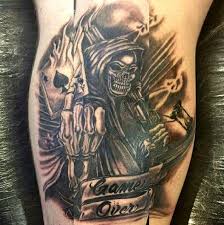 The reaper resembles a fallen angel and confuses the viewer. Evil Grim Reaper Tattoo Designs Elegant Arts Tattoo