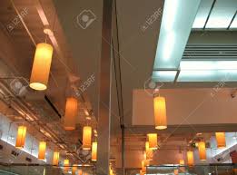 7pmlighting industrial pendant hanging lights with handblown 3d fireworks glass shade for dining room kitchen island restaurants. Restaurant Ceiling With Hanging Light Fixtures And Glass Partitions Stock Photo Picture And Royalty Free Image Image 906184
