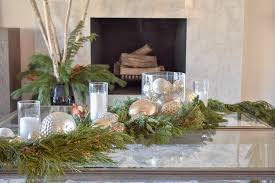 Find that perfect log for your table and drill small holes lengthwise to add small tealight candles. Silver And Gold Christmas Centerpiece With Evergreens Home With Holliday