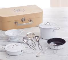 The handles of the doors are accentuated with a silver finish. Cooking Set In Play Personalized Case Toy Kitchen Accessories Pottery Barn Kids