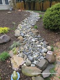 Natural looking dry rock bed. Diy Dry Creek Beds The Garden Glove
