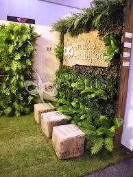 Plants As Walls And Flooring With Burlap Covered Ottomans Exhibition Stand Design Exhibition Design Exhibition Stand