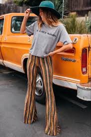 Fitted throughout the hips and thighs, and broadened from the knees to the hems, 1970s flare jeans were a staple of the era. Pin On Style