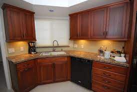 Starmark Lyptus With Nutmeg Stain And Cambria Canterbury Quartz Kitchen Cabinets In Bathroom Cabinet Design Kitchens Bathrooms