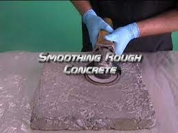 My walls are solid 4 thick concrete slabs. Smoothing Rough Concrete Youtube