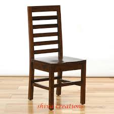 Each chair is crafted from solid ash wood and has an angular, open back and armless design that sits on four straight, slightly splayed legs. Indian Wholesale Solid Sheesham Wooden Restaurant Cafe Hotel Dining Chairs Buy Wood Design Dining Chair Wooden Dining Chair Wood Design Dining Chair Product On Alibaba Com