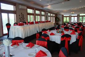 Head Table On Risers Red And Black Wedding Black Chair Covers And Red Sashes Red Napkins Red Wedding Black Chair Covers Chair Covers Wedding Chair Covers