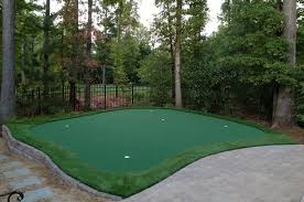 Raked, and sifted entire area to remove any rocks, old roots. Build Your Own Practice Green North Carolina Synthetic Putting Greens East Coast Synthetic Turf