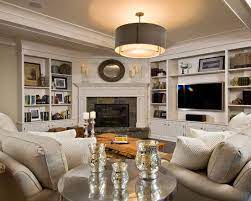 By adding the exposed shelving, you can create a beautiful collage of photos, plants and holiday décor all year long. Bookcase Fireplace Built Ins Corner Fireplace Makeover Living Room Furniture Layout