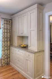 White kitchen cabinets with ornament can give your kitchen a classic and elegant look. White Stained Kitchen Cabinets Home Furniture Design Stained Kitchen Cabinets Built In China Cabinet Pantry Design