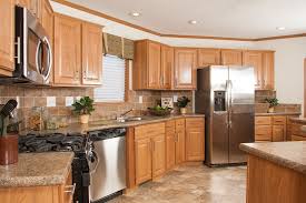Tl806a Timberland Ranch Kitchen With Oak Cabinets And Stainless Steel Appliances Kitchen Renovation Kitchen Remodel Oak Kitchen