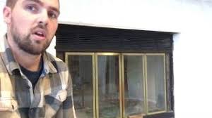 Painting the brass would be an easy solution. How To Paint A Brass Fireplace Door Youtube