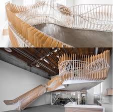 A Mezzanine Lounge Hovers With A A Cool And Crazy Skeletal Staircase That Leads To A Hovering Mezzanine With A Guardrail House Styles Design Milk Rug Shopping