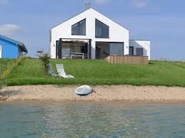 Grosszugiges Ferienhaus Mit Privatstrand Offenem Kamin Sauna Direkt Am See Lobnitz Ferienhaus Ferien Ferienhaus Am See