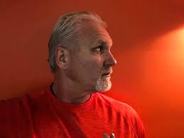 It occurred to me just now...when I wear orange and stand in front of our  office orange wall...you can't see me. And that's why people in my office  just walk by without