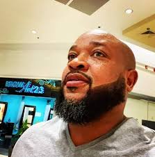 A former professor at Spelman College, a historically Black institution for  women, said he was fired after he refused to inflate the grades of students.