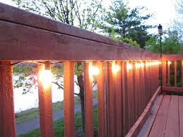 Measure your string lights to run the entire length of the deck railing. 55 Summer Porch Decor Ideas To Inspire You This Season Outdoor Deck Lighting Summer Porch Decor Deck Lighting
