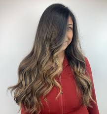 The hairstyle looks great from behind, using the blonde color to appear bouncier and more casual. Top 9 Black Hair With Blonde Highlights Ideas In 2021