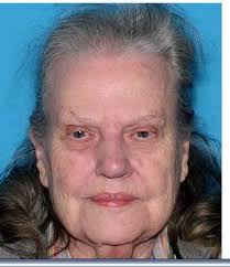 Woman tied to elderly woman's death says she died of 'violent means'