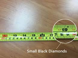 The first inch on a tape measure is actually short by 1/16 of an inch, because the metal on the tang is exactly 1/16 of an inch. Black Diamond On Measuring Tape Meaning Richard Brothers