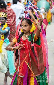 As with other aspects of indian culture, different forms of dances originated in different parts of india, developed according to the local traditions and also imbibed elements from other parts of the country. Indian Girl Dancing In A Festival Parade Photograph By Tim Gainey