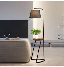 Güvenli yaşam alanları olan evler her dönem dekorasyonu ile. Modern Siyah Mat Metal Ahsap Sehpali Lambader Modelleri Ve Fiyati Dekopasaj