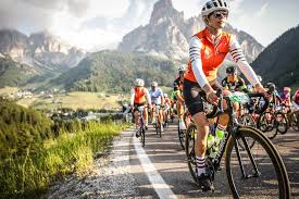 It is a strikingly beautiful pass rising up to 2,192 metres from dense woodland into a rocky landscape framed by giant mountains. Best Maratona Dles Dolomites Package Amazing Cycling Adventure Velo Monaco