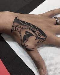 Hand tattoo ideas are not something new in the tattoo community. Snake Tattoo Designs Meanings 2020 Guide Tattoo Stylist Snake Tattoo Design Tattoo Designs And Meanings Tattoos