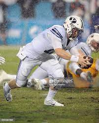 Byu Cougars Quarterback Tanner Mangum Tens For A Touchdown In The Byu Cougars Quarterback Ncaa College Football