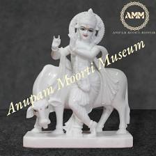 Krishna with cow marble statue