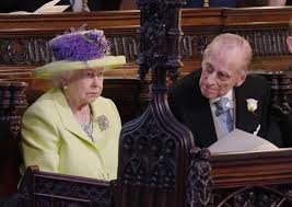 Prince philip pays homage to elizabeth ii during her coronation in 1953 ws prince philip, the duke of edinburgh kneels before the queen the first to pay fealty and homage / they kiss / the queen sitting on the chair of estate flanked by harold bradfield, michael ramsey Prince Philip Compares Meghan Markle To Wallis Simpson Book