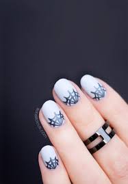Now we offer you spider nail designs and give you some ideas for a new nail design that might just scare your friends, colleagues, or even you! Half Moon Spider Web Nails For Halloween