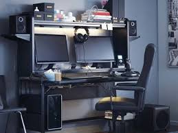 A Dark Room With An Elaborate Computer Gaming Setup Ikea Computer Desk Office Computer Desk Desk