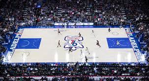 The team's traditional red, white and blue color scheme is used to help drive home the point, along with the 13 stars that are arranged in a circle above the 7 in certain variations. 76ers To Use Snake Logo At Center Court For Playoffs