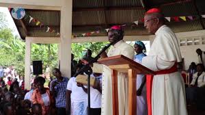 ( alberto pizzoli/afp/getty images ). Cardinal John Njue Distributes Sweets To Children Youtube