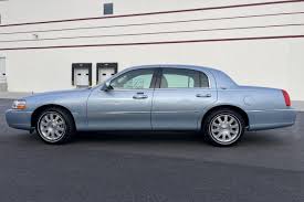 Image result for Light Ice Blue 2008 Town Car