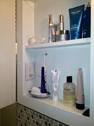 Medicine Cabinet With Outlet Inside Bathroom Clutter Buster Install An Outlet Inside The Medicine Bathroom Medicine Cabinet Bathroom Outlet Remodled Bathrooms