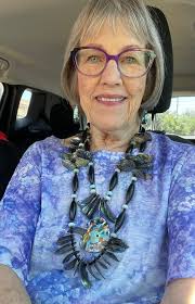 Abalone/mop beaded earrings with shell centers