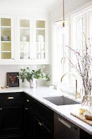 10 Tricks To Make A Small Kitchen Look Bigger Cottage Kitchen Design Home Kitchens Kitchen Remodel Design