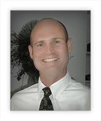 Dr. Aaron M. Warnock, MD